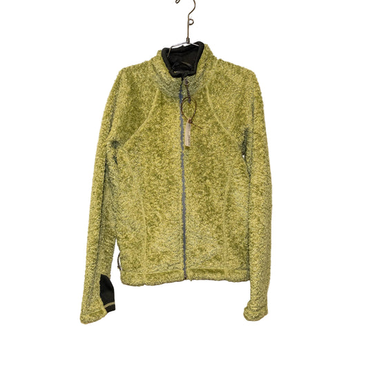A textured, fuzzy zip-up fleece jacket in a heathered olive green color, hanging on a black metal hanger against a plain off-white wall.